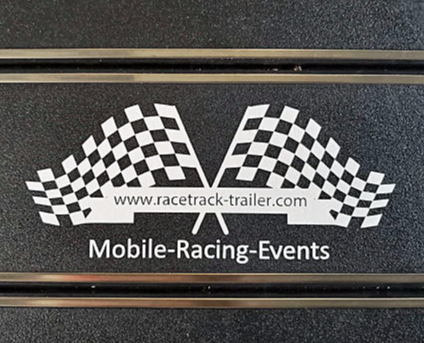 logo of racetrack-trailer on the rail